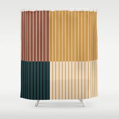 a shower curtain with different colored stripes on it