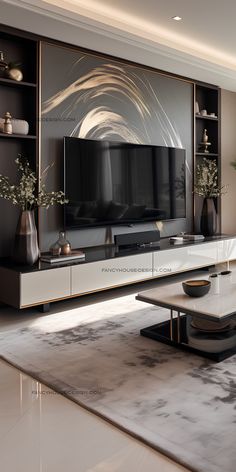 a modern living room with an entertainment center and large screen tv on the wall in front of it