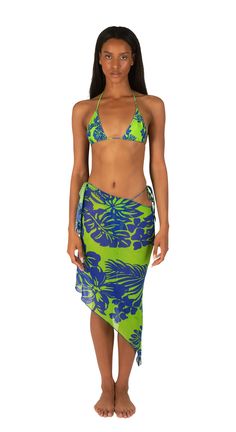 Mesh asymmetrical sarong 82% Polyester / 18% Spandex Hand wash cold, hang to dry Manufactured in Los Angeles Model is 5'9 - wearing a size small TOP SOLD SEPARATELY Green Tropical Beach Skirt, Green Asymmetrical Skirt For Beach, Green Asymmetrical Skirt For The Beach, Green Asymmetrical Fitted Skirt, Fitted Asymmetrical Green Skirt, Green Beachwear Skirt For Summer, Green Asymmetrical Beach Skirt, Asymmetrical Green Bottoms For Summer, Fitted Green Skirt For The Beach