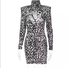 Bodycon Black & White Tiger Shoulder Pad Dress White Club Dress For Fall, White Bodycon Dress For Fall Evening, White Fitted Bodycon Dress For Fall, Fitted White Bodycon Dress For Fall, White Bodycon Dress For Fall Night Out, White Bodycon Dress For Night Out In Fall, Black And White Long Sleeve Party Dress, Fitted Long Sleeve Black And White Dress, Fitted Black And White Long Sleeve Dress