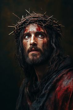 a man with blood on his face and crown of thorns around his head is staring into the distance