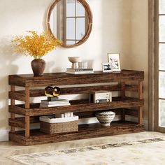 a living room with a mirror, vase and bookshelf on the shelf in front of it