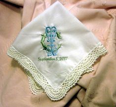 This personalized wedding handkerchief includes 2 initials. They can be your initials or the first initials of the bride and groom. You may choose any colors on the chart. Made of cotton and 13in square for the ladies or 17in. for a mans handkerchief. Please specify if you want a mans in the note section of the order. Elegant Personalized Handkerchief For Bridesmaid Gift, Elegant Customizable Handkerchiefs For Bridesmaid Gift, Elegant Customizable Handkerchiefs For Personalized Gifts, Elegant Personalized Wedding Handkerchiefs, Elegant White Handkerchiefs For Personalized Gift, Elegant Initials Handkerchiefs For Wedding Gift, Elegant Handkerchiefs With Initials For Wedding Gift, White Monogrammed Handkerchiefs For Gift, White Monogrammed Handkerchiefs As Gift