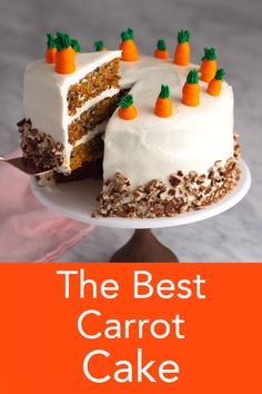 the best carrot cake recipe is made with white frosting and topped with fresh carrots