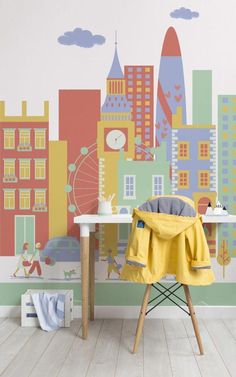 a child's room with a city wall mural