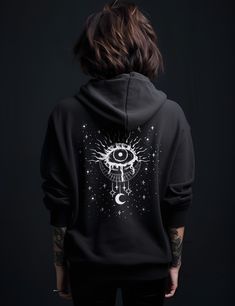 "If your size is not available, click this in the dropdown and select \"Let me know when it's back\" to get on the waitlist! Thank you for your patience and understanding! Get 10% off your first order: join.lucidamystica.com Mystical evil eye on a zip up unisex goth hoodie that's soft, cozy and warm for the colder months. Front of hoodie is blank. Plus sizes available for a roomy fit, size up for an oversized aesthetic look. Size chart found in images.  Perfect for yourself or as a gift for your Edgy Plus Size, Plus Size Alt, Goth Hoodie, Oversized Aesthetic, Inner Power, Aesthetic Hoodie, Aesthetic Look, Unisex Tshirt, Clothing Ideas