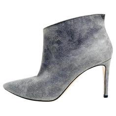 Gianvito Rossi Suede Ankle Boots Grey boots designed with a pointed toe and stiletto heel. Featuring slip-on style, slit detail to rear and leather lining. Size – 35.5 Condition – Good (General signs of wear, scratch to the heel) Composition – Suede Comes with – Box Signs Of, Grey Boots, Designer Boots, Suede Ankle Boots, Gianvito Rossi, Stiletto Heel, Stiletto Heels, Clothing And Shoes, Ankle Boot