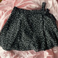 Never Worn Nwt Black Floral Wrap Skirt Black Skort For Spring, Black Flowy Mini Skirt For Spring, Black Skort For Spring Day Out, Casual Asymmetrical Flowy Skort, Casual Asymmetrical Skort, Trendy Black Mini Skirt From Forever 21, Forever 21 Flowy Skort For Summer, Summer Relaxed Skort From Forever 21, Forever 21 Black Bottoms For Spring