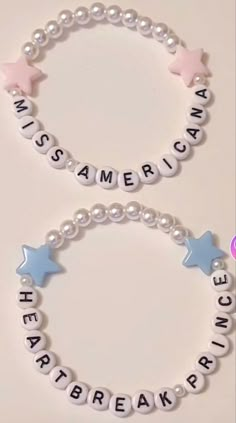 two bracelets with words and stars on them