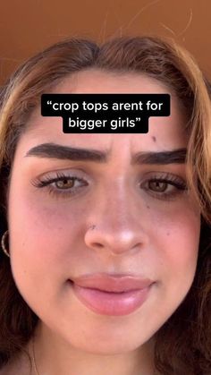 a close up of a person with a speech bubble above her head that says crop tops aren't for bigger girls