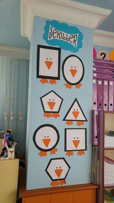 a penguin bulletin board in a child's room