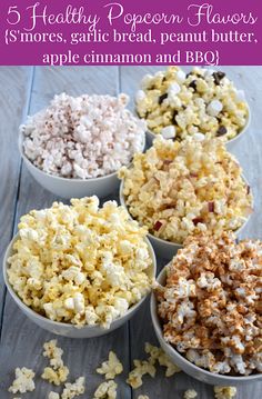 five different types of popcorn in bowls on a wooden table with text overlay that reads, 5 healthy popcorn flavors for more garlic bread, peanut butter, apple cinnamon and bbq