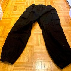 Cotton Cargo Jogger Pants With Pockets Black Straight Leg Sweatpants For Outdoor, Black Cotton Cargo Joggers, Black Cotton Cargo Style Joggers, Black Cotton Joggers With Multiple Pockets, Black Cargo Style Joggers, Sporty Black Cargo Style Pants, Black Cotton Utility Sweatpants, Black Cargo Pocket Sweatpants, Black Cargo Style Straight Leg Sweatpants