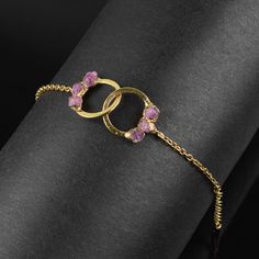 GemFormingStudio D E T A I L S Pink Tourmaline Bracelet | Gemstone Bracelet | Gold Bracelet | Birthstone Bracelet | Chain Bracelet | Rope 24k Chain Bracelet | Gift For Her [GFS4659] Stone Name : Pink Tourmaline Stone Size: 7 x 7 mm Weight: 5.47 gm Material: Brass Polish: All Plating are Available . Contact us for wholesale prices. R I N G S https://www.etsy.com/in-en/shop/GemFormingStudio?section_id=22783374 B E A D S https://www.etsy.com/in-en/shop/GemFormingStudio?section_id=22828835 W A N D S Adjustable Yellow Gold Round Crystal Bracelet, Brass Jewellery Handmade, Rough Stone Ring, Bracelet Rope, Bracelet Stone, Tourmaline Bracelet, Electroformed Jewelry, Birthstone Bracelet, Tourmaline Stone