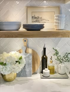 the kitchen counter is clean and ready to be used for cooking or serving dishes on it