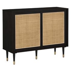 the sideboard is made from wood and has two doors