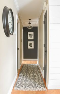 the hallway is clean and ready for us to use as an entrance way in this home