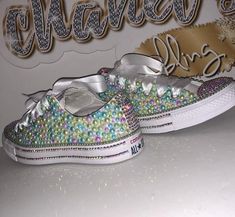 Custom Bling Converse All Star Chuck Taylor Sneakers. All designs handmade and embellished with a variety of high quality crystals. Great for weddings, proms, homecomings, birthdays, special events or just your everyday girly girl. Turn around time is currently 2 - 3  weeks **IF YOU NEED THIS ITEM BEFORE THE PROJECTED SHIPPING TIME YOU MUST CONTACT US BEFORE ORDERING (additional charges may apply) **Shoe Details:WHITE low top Converse All Star Chuck Taylor Sneaker  (cloth material style)Shoe Siz Bedazzled Converse, Red High Top Converse, White Low Top Converse, Bling Converse, Ribbon Shoes, Low Top Converse, Diy Sneakers, Teal Light, Bling Fashion