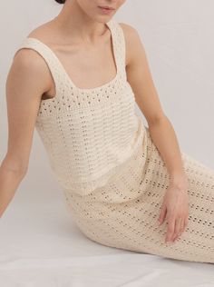 The estimated shipping window on all resort pre-orders is 1/15/24 - 2/1/24. We are pleased to introduce the newest technique to our apparel collection - crochet. The Lyric Top is a breezy, timeless tank with stunning handwork that evokes an effortless sense of luxury. Pair it with the Roma Top for a layered look or simply with your favorite short for a chic, seasonal ensemble. Made with 100% Cotton Handmade in Peru Hand wash, lay flat to dry Honoring Earth + Maker Our knitwear is handcrafted in Peru, preserving age-old Peruvian textile traditions. They are made in beautiful, family-operated studios under safe working conditions for fair wages. Crochet Crop Tank, Peruvian Textiles, Crochet Crop, Beautiful Family, Layered Look, Crop Tank, Lay Flat, Crochet Top, Knitwear