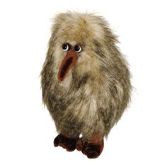 a stuffed animal bird with big eyes and fur on it's head, standing upright