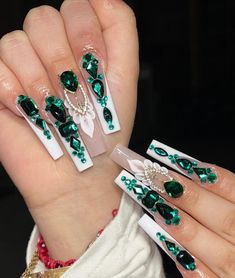 White French tips with green rhinestones and gems on super long square nails Emerald Nails With Rhinestones, Green Bling Nails Rhinestones, Dark Green Nails With Gems, Nails With Gems On Them, Nails With Green Rhinestones, Baptism Nails, Green Rhinestone Nails, White And Green Nails, White French Tips