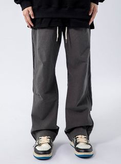 It's officially the time of year when anything goes, and our new favorite go-to pants are the perfect example of that. With a versatile straight fit and a comfortable waistband, these pants can be paired with any top for a casual, put-together look. The back strap detail and side zippers make these pants unique and stylish, perfect for anyone who wants to feel confident and comfortable.
Gender: MenMaterial: PolyesterClothing Length: Full Length Edgy Streetwear, Streetwear Inspiration, Straight Fit Pants, Urban Wear, Side Zip, Side Zipper, Back Strap, Crop Top, Bottoms Pants