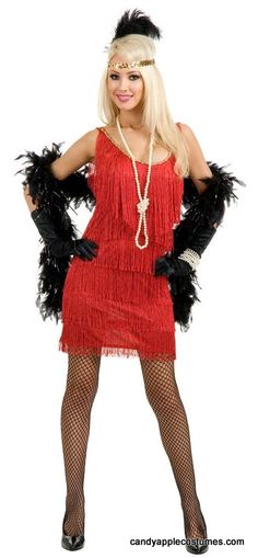 a woman in a red flap dress and black feathered gloves posing for the camera