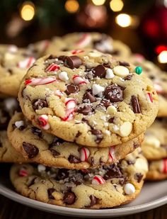 a white plate topped with cookies and candy canes