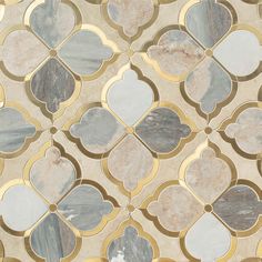 an artistic tile design with gold and grey accents