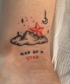 a tattoo on the ankle that says nap of a star with a red star above it