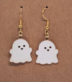 Handmade ghost earrings. Gold-plated and hypoallergenic. Please allow 1-2 business days for shipping. Ships from Tennessee. Ghost Earrings, Tennessee, Ghost, Favorite Jewelry, Jewelry Earrings Dangle, Etsy Earrings, Dangle Drop Earrings, Dangle Earrings, Plating