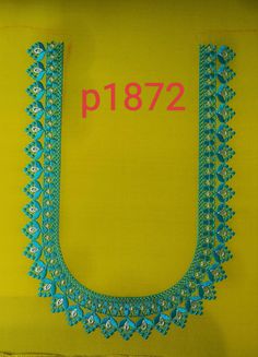 a blue and green beaded necklace on a yellow background with the number p872