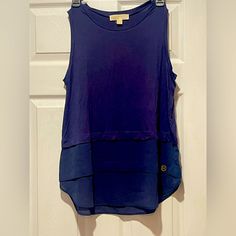 Nwt Sleeveless Blouse, Never Worn. Cute Top, Some Sheer Layering At The Bottom But You Can Not See Through The Shirt. Blue Sleeveless Vest Top, Chic Blue Tank Vest, Blue Tank Vest Blouse, Sleeveless Blue Tops For Layering, Blue Tank Top For Layering, Blue Tank Top For Layering In Summer, Blue Tank Top For Summer Layering, Blue Casual Tank Top For Layering, Chic Blue Sleeveless Tank Top