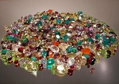 Natural gem wholesale lot for jewelers 200+ carat mixed lot from above large gem parcels type:        natural mined gem stones carat:      200+ carats from pictured larger gem parcels / wholesale scoop clarity:    loupe clean - eye clean - slight inclusion - inclusion facet:       full facet variety:   200+ carats from pictured larger parcels at wholesale scoop origin:       africa, sri lanka & brazil size:           mixed size lot / 3 carats to 10 pointer accents lot:            random scoop of Knitting Clothes, Faceted Gems, Gems Art, Topaz Color, Peridot Gemstone, Green Agate, Citrine Gemstone, Aquamarine Gemstone, Green Amethyst