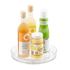 three different types of body care products on a clear tray