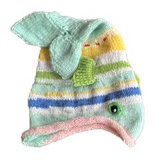 A handmade knit fish-shaped hat is a delightful and whimsical creation! Picture a cozy hat that is expertly crafted with soft yarn, lovingly transformed into the shape of a fish. The hat is designed to resemble a cute little fish, complete with fins and a tail, making it a fun and unique accessory for anyone to wear. The vibrant colors of the yarn bring the fish to life, adding a playful touch to the hat. Imagine a combination of shades like blues, greens, and even a splash of yellow or orange, Fish Beanie, Knit Fish, Fish Clothes, Fish Outfit, Fish Hat, Best Winter Hats, Fun Hats, Funky Hats, Cute Hat