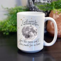 a coffee mug with the words i will never be a morning person for the moon and i are much too in love