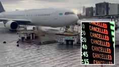 an airplane sitting on the tarmac with its landing gear down and luggage being loaded onto it