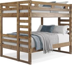 a wooden bunk bed with white sheets and blue throw pillows on the bottom row, against a white background