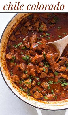 a close up of a pot of food with a wooden spoon in it and the title above it