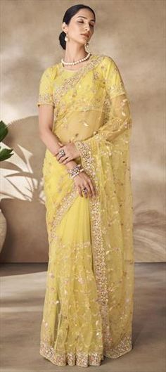 Yellow color Saree in Net fabric with Sequence, Thread, Zircon work Yellow Cutdana Blouse Piece For Wedding, Yellow Blouse Piece For Wedding And Festivals, Yellow Blouse For Wedding And Festivals, Yellow Organza Traditional Wear For Wedding, Yellow Blouse Piece For Wedding And Diwali, Yellow Wedding Blouse Piece With Traditional Drape, Yellow Festive Blouse Piece For Weddings, Yellow Wedding Blouse Piece, Festive Yellow Blouse Piece For Wedding