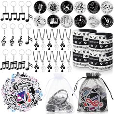 a bunch of items that are sitting on a white surface with black and white designs