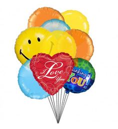 a bunch of balloons with the words love you on them