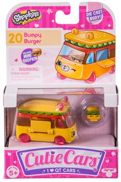 the toy bus is yellow and has a pink box on it's front, which says cutie cars