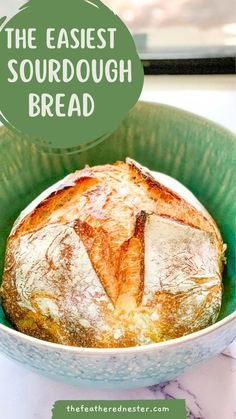 the best sourdough bread is in a green bowl