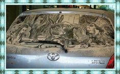 a car with some drawings on the side of it's hood and back window