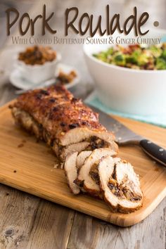 pork roulade with candied butter, squash and ginger chutney on a cutting board