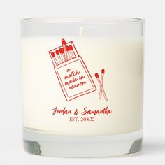 a candle with matches on it and the words match made in heaven printed on it