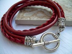 Womens  Leather Bracelet  Toggle Closure  by UrbanSurvivalGearUSA, $21.99 Handmade Red Wrap Bracelet, Adjustable Burgundy Bracelets, Trendy Red Adjustable Leather Bracelet, Bracelet En Cuir Diy, Red Leather Bracelet, Diy Leather Bracelet, Leather Bracelets Women, Womens Jewelry, Toggle Bracelet