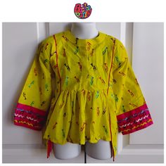 This Is New With Tags. Size 6/7. Longer In The Back Than It Is In The Front. Yellow Long Sleeve Sets For Summer, Cute Yellow Fitted Blouse, Yellow Long Sleeve Summer Set, Summer Yellow Long Sleeve Sets, Cute Yellow Spring Blouse, Festive Yellow Cotton Top, Festive Long Sleeve Shirt For Spring, Fitted Yellow Playful Tops, Fitted Playful Yellow Tops